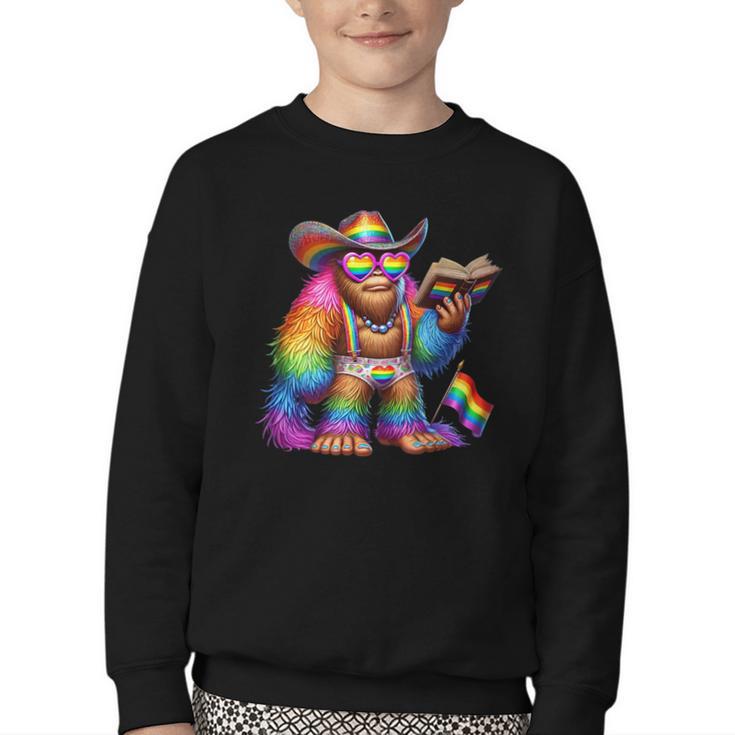 Rainbow Pride Bigfoot Reading Book With Heart Glasses Youth Crewneck Sweatshirt