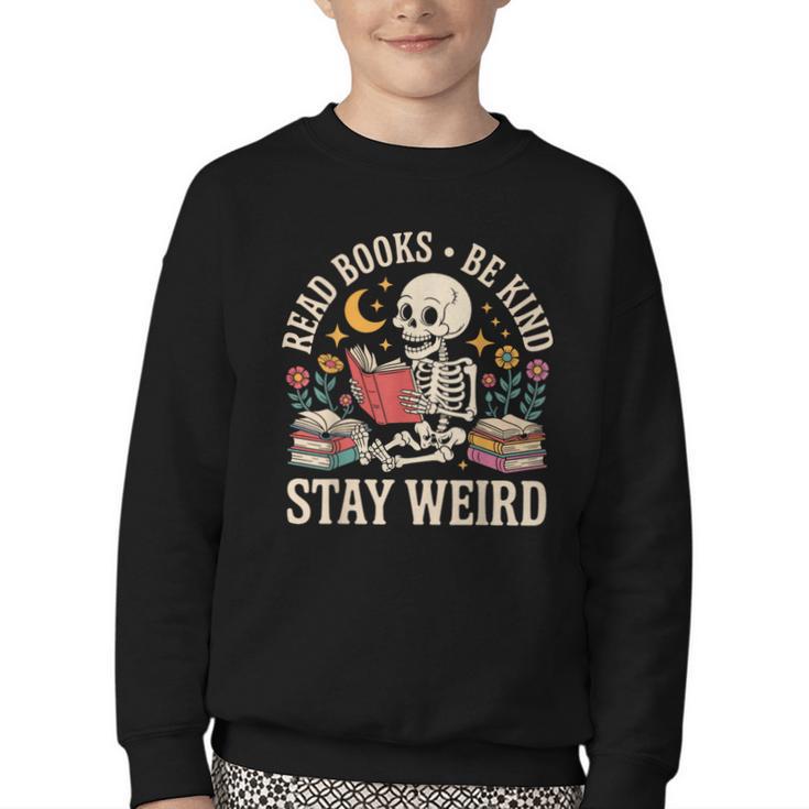 Read Books Be Kind Stay Weird Skeleton Reading Book Youth Crewneck Sweatshirt