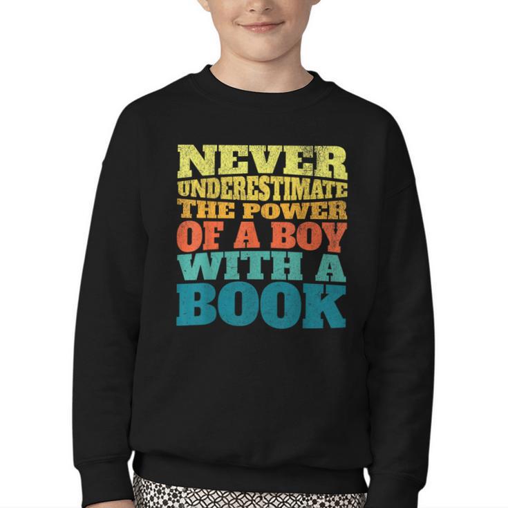Retro Never Underestimate The Power Of a Boy With a Book Youth Crewneck Sweatshirt