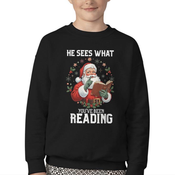 He Sees What You'Ve Been Reading Santa Book Lover Youth Crewneck Sweatshirt