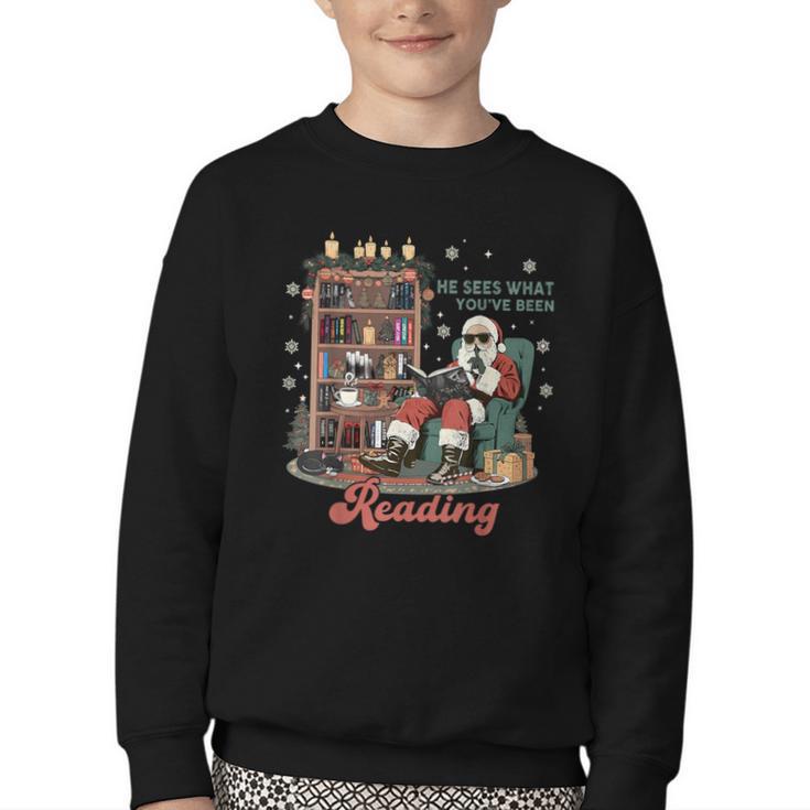 He Sees What You'Ve Been Reading Santa Christmas Bookish Youth Crewneck Sweatshirt