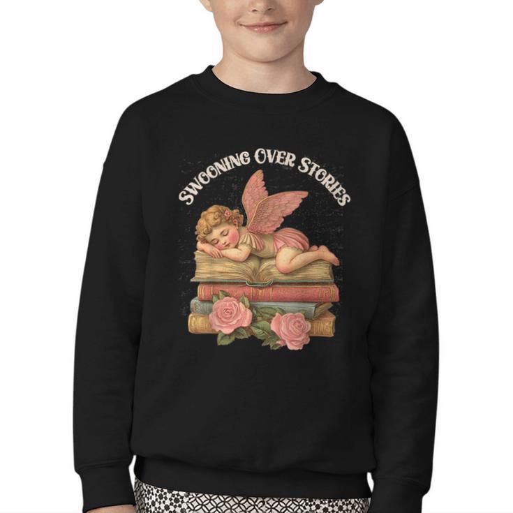 Valentine's Swooning Over Stories Cupid And Book Lover Tee Youth Crewneck Sweatshirt