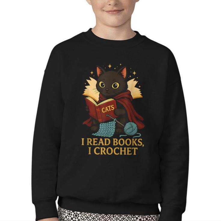 Wizard Cat Reading a Book While Crocheting Youth Crewneck Sweatshirt
