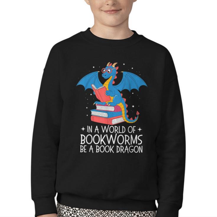In A World Full Of Bookworms Be A Book Dragon Reading Youth Crewneck Sweatshirt