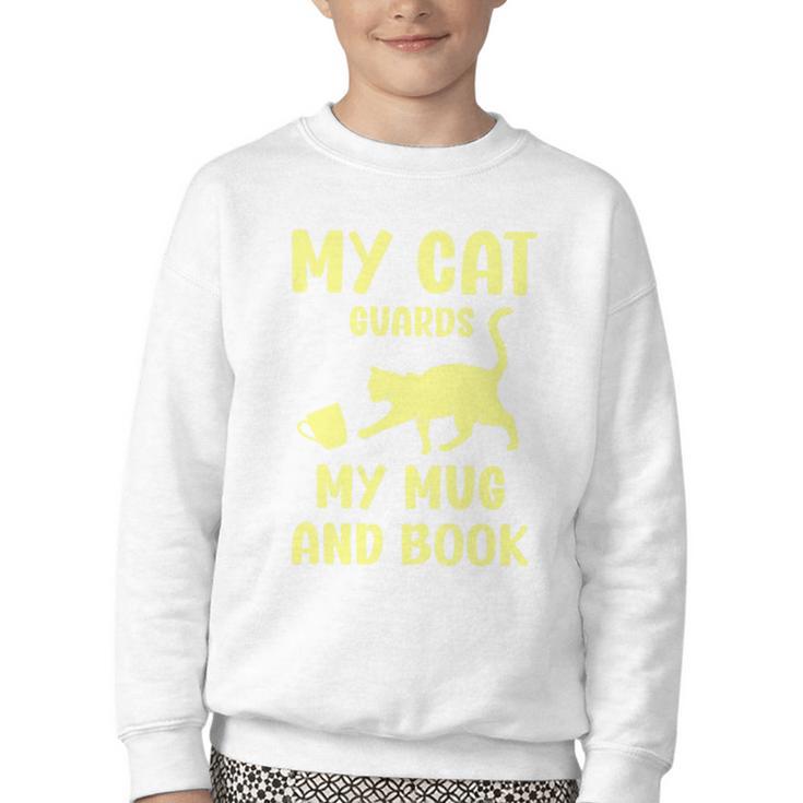 My Cat Guards My Mug And Book Humor Cats Premium Tri-Blend Youth Crewneck Sweatshirt