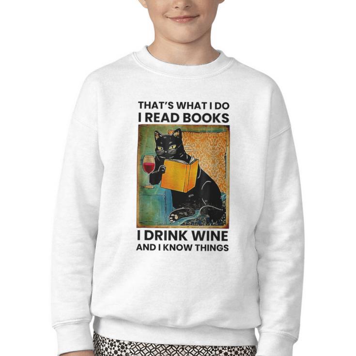 That's What I Do I Read Books I Drink Wine And I Know Things Youth Crewneck Sweatshirt
