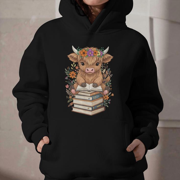 Cute Baby Highland Cow Reading Book Librarian Bookworm Graphic Youth Hoodie Cute Baby Highland Cow Reading Book Librarian Bookworm Graphic Youth Hoodie