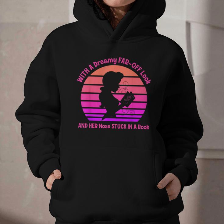 With A Dreamy Far-Off Look And Her Nose Stuck In A Book Graphic Youth Hoodie