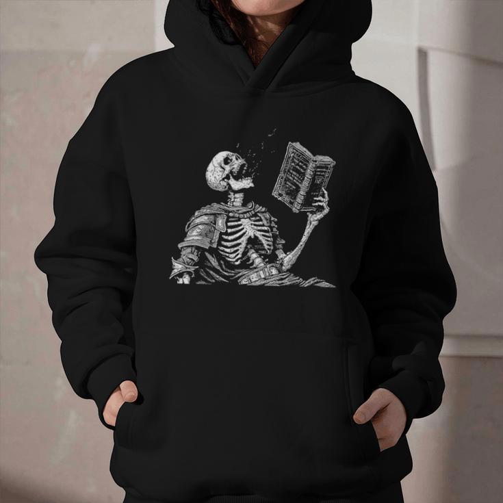 Hilarious Skeleton Holding a Book And Laughing Gothic Graphic Youth Hoodie Hilarious Skeleton Holding a Book And Laughing Gothic Graphic Youth Hoodie