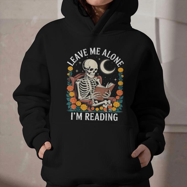 Leave Me Alone Skeleton Reading Book Floral Moon Librarian Graphic Youth Hoodie