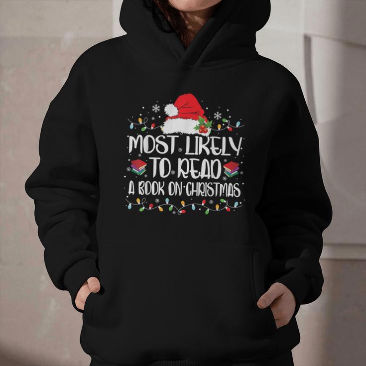 Most Likely To Read A Book On Christmas Family Matching Graphic Youth Hoodie Most Likely To Read A Book On Christmas Family Matching Graphic Youth Hoodie