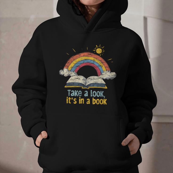 Take a Look It's In a Book Vintage Reading Teacher Rainbow Graphic Youth Hoodie