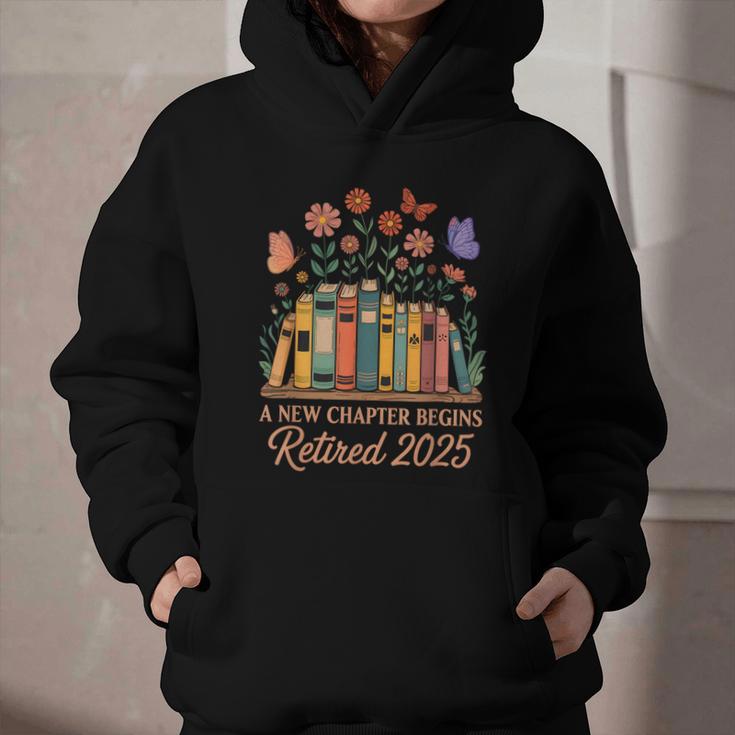 A New Chapter Begins Retired 2025 Books Flowers Graphic Youth Hoodie
