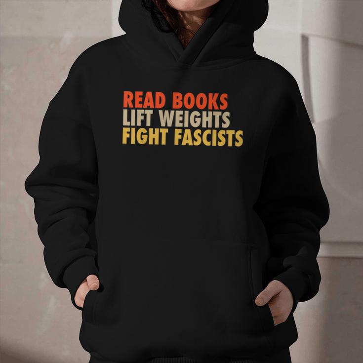 Read Books Lift Weights Fight Fascists Reading Humor Graphic Youth Hoodie