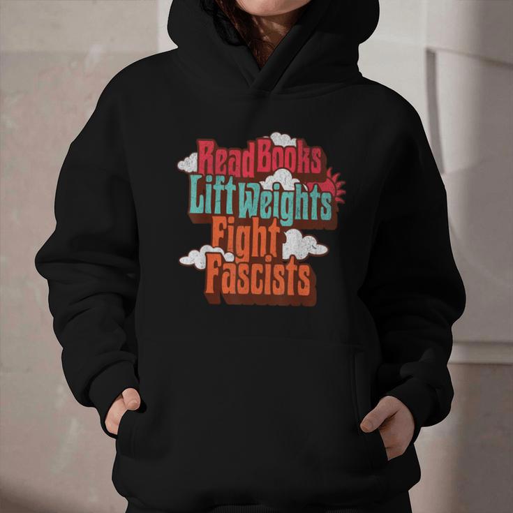 Read Books Lift Weights Fight Fascists Reading No Kings Graphic Youth Hoodie