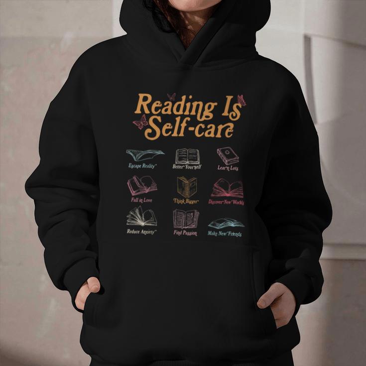 Reading Is Self Care Mental Health Read More Book Graphic Youth Hoodie
