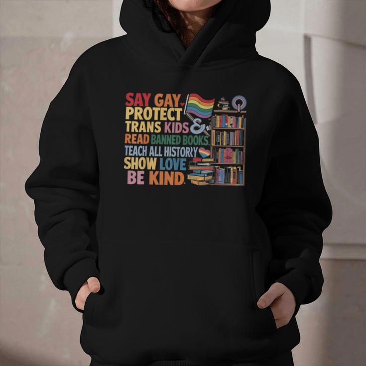 Say Gay Protect Trans Kids Read Banned Books LGBTQ Gay Pride Graphic Youth Hoodie Say Gay Protect Trans Kids Read Banned Books LGBTQ Gay Pride Graphic Youth Hoodie