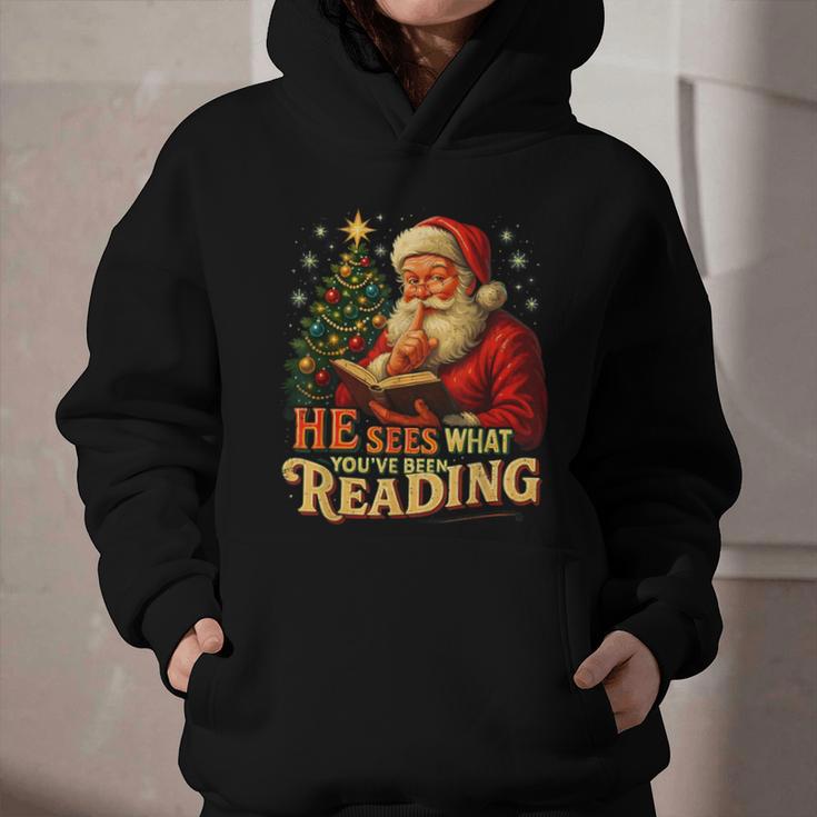 He Sees What You’Ve Been Reading Santa Book Lover Christmas Graphic Youth Hoodie He Sees What You’Ve Been Reading Santa Book Lover Christmas Graphic Youth Hoodie
