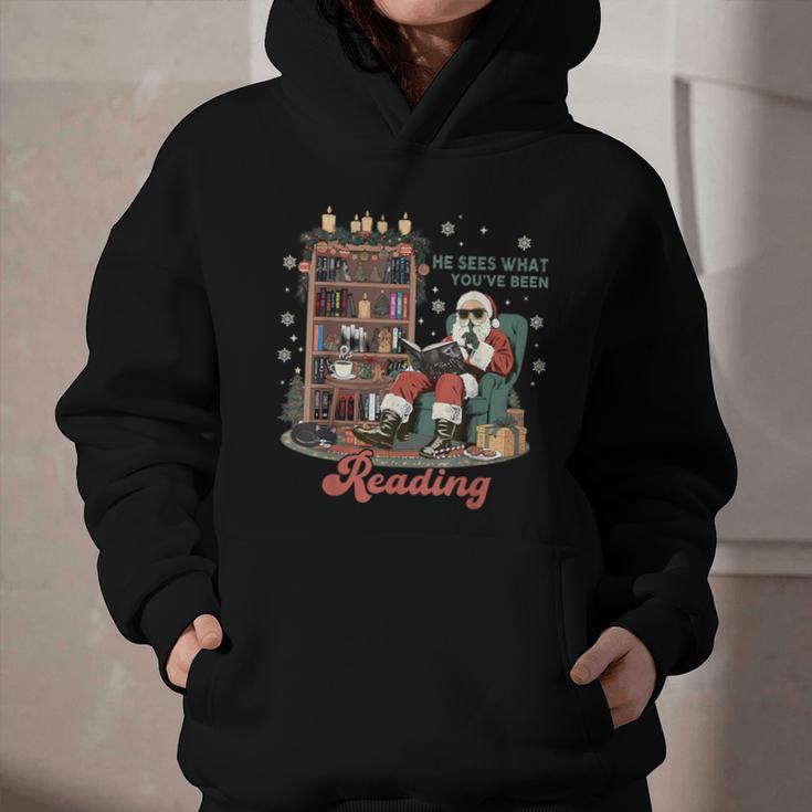He Sees What You'Ve Been Reading Santa Christmas Bookish Graphic Youth Hoodie He Sees What You'Ve Been Reading Santa Christmas Bookish Graphic Youth Hoodie