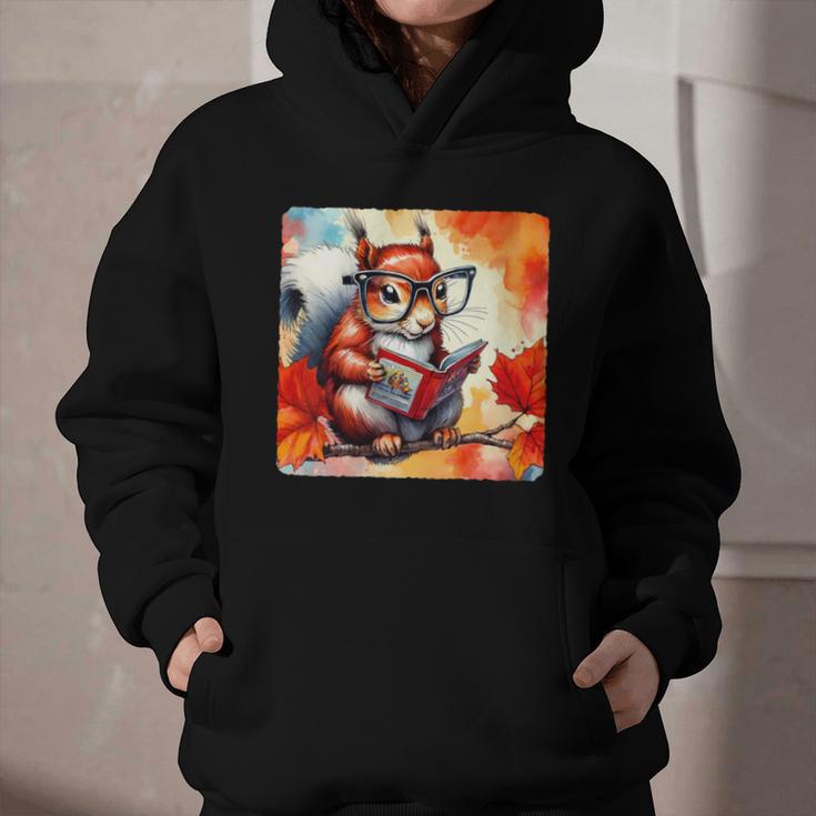 Squirrel Reading Comic Book On Autumn Branch Glasses Leaves Graphic Youth Hoodie