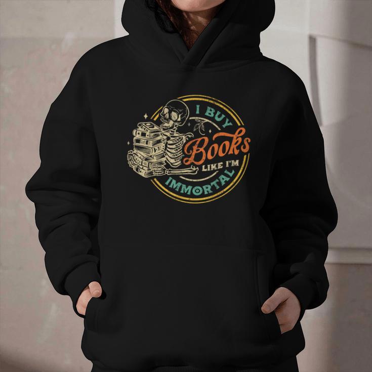 Vintage I Buy Books Like I'm Immortal Skeleton Reading Book Graphic Youth Hoodie