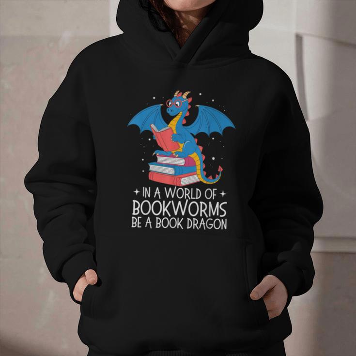 In A World Full Of Bookworms Be A Book Dragon Reading Graphic Youth Hoodie