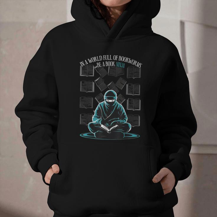In A World Full Of Bookworms Be A Book Ninja Reading Reader Graphic Youth Hoodie In A World Full Of Bookworms Be A Book Ninja Reading Reader Graphic Youth Hoodie