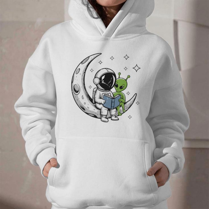 Astronaut Reading Book To Alien Moon Space Astronomy Graphic Youth Hoodie