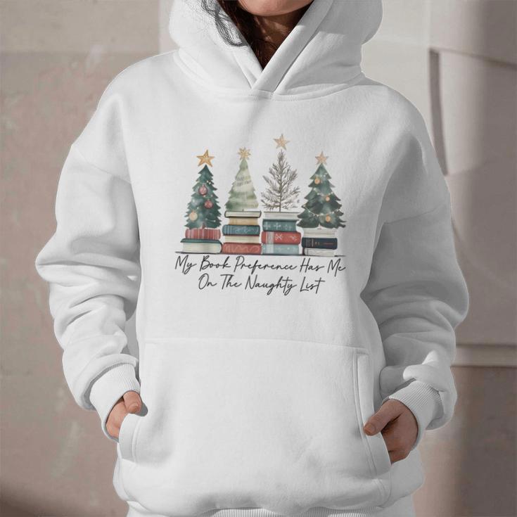 My Book Preference Has Me On The Naughty List Christmas Tree Graphic Youth Hoodie My Book Preference Has Me On The Naughty List Christmas Tree Graphic Youth Hoodie