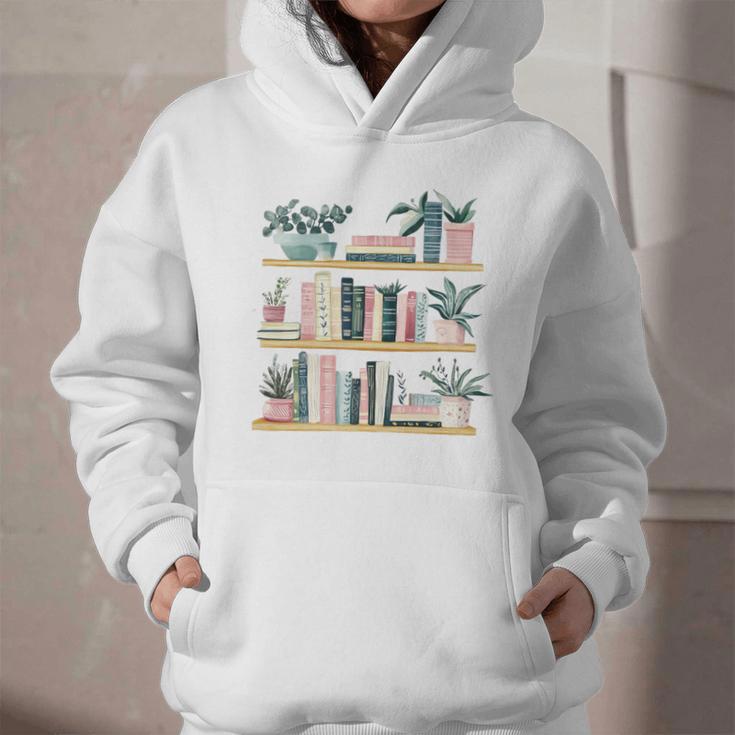 Bookshelves With Books & Plants Premium Graphic Youth Hoodie Bookshelves With Books & Plants Premium Graphic Youth Hoodie