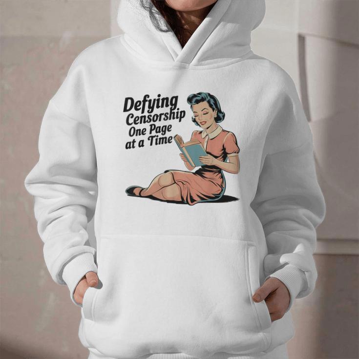 Defying Censorship One Page At a Time Read Banned Books Graphic Youth Hoodie Defying Censorship One Page At a Time Read Banned Books Graphic Youth Hoodie