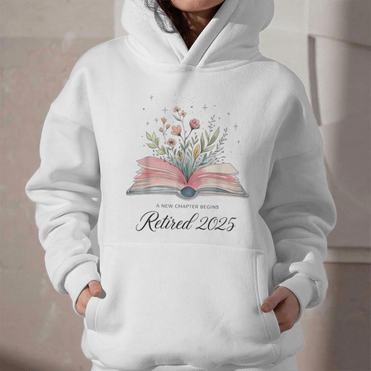 Quote New Chapter Begins Retired 2025 Floral Open Book Graphic Youth Hoodie