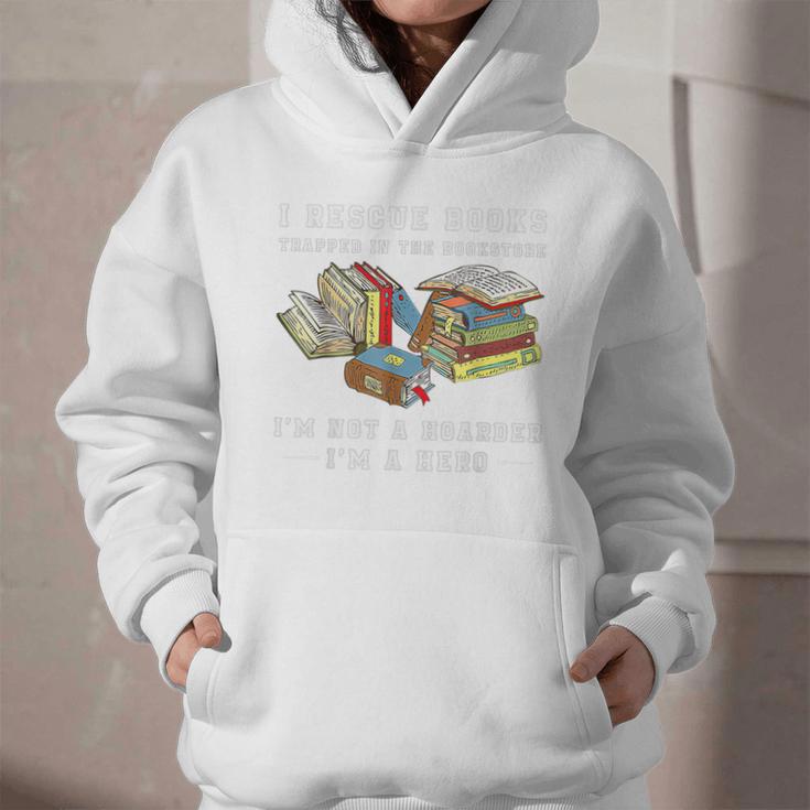 I Rescue Book Trapped In The Bookstore I'm Not A Hoarder Premium Tri-Blend Graphic Youth Hoodie I Rescue Book Trapped In The Bookstore I'm Not A Hoarder Premium Tri-Blend Graphic Youth Hoodie