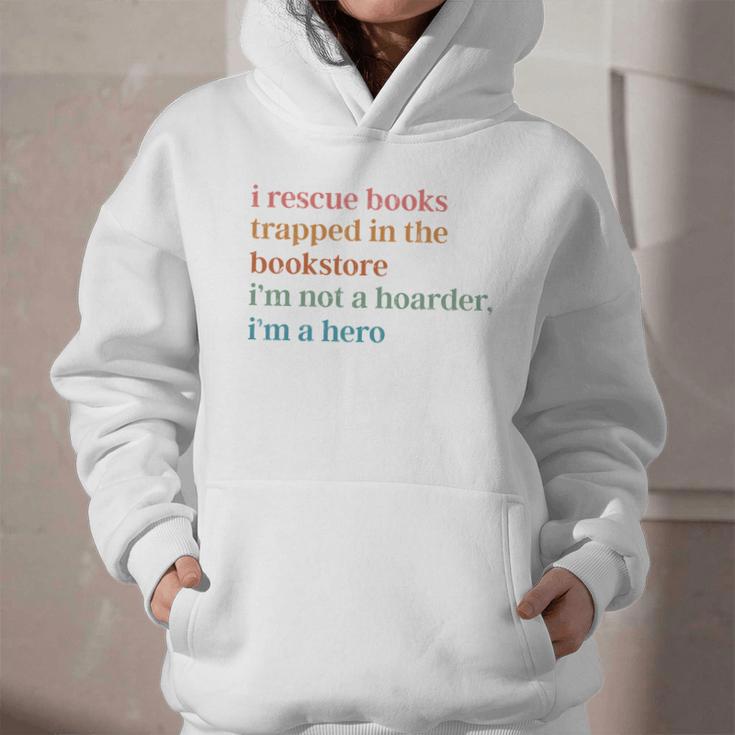 I Rescue Books Trapped In The Bookstore I'm Not A Hoarder Graphic Youth Hoodie I Rescue Books Trapped In The Bookstore I'm Not A Hoarder Graphic Youth Hoodie