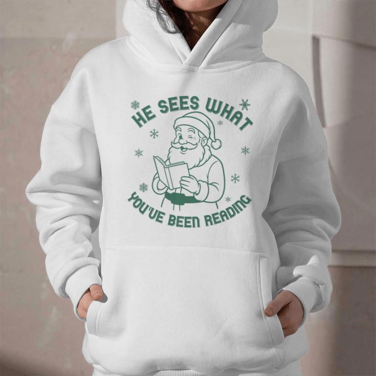 He Sees What You'Ve Been Reading Christmas Bookish Santa Premium Tri-Blend Graphic Youth Hoodie He Sees What You'Ve Been Reading Christmas Bookish Santa Premium Tri-Blend Graphic Youth Hoodie