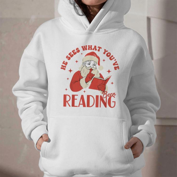He Sees What You'Ve Been Reading Santa Book Graphic Youth Hoodie