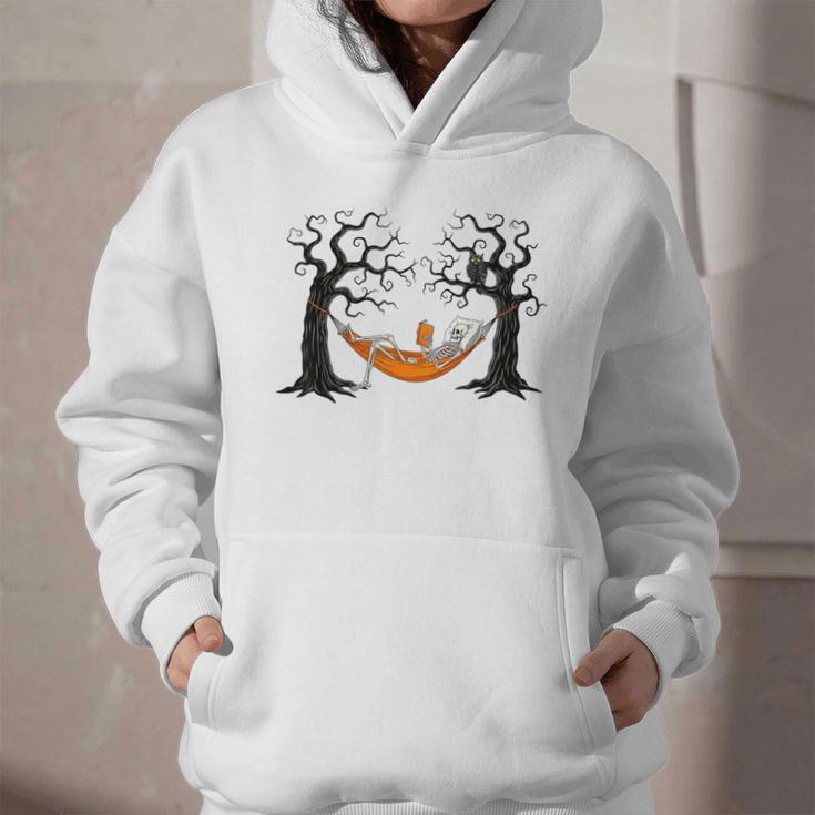 Skeleton Reading Book In Hammock Halloween Reader Graphic Youth Hoodie