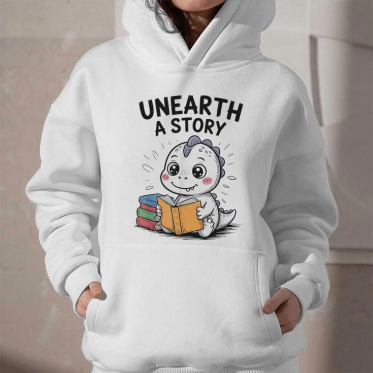 Unearth a Story Cute Dinosaur Summer Reading 2026 Dino Book Graphic Youth Hoodie