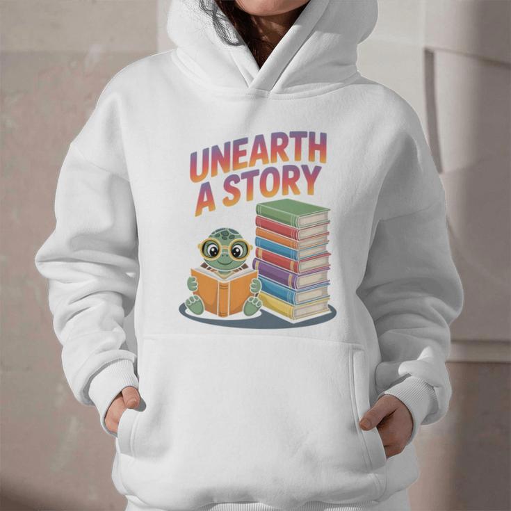 Unearth A Story Cute Turtle Reading Books Librarian Graphic Youth Hoodie Unearth A Story Cute Turtle Reading Books Librarian Graphic Youth Hoodie