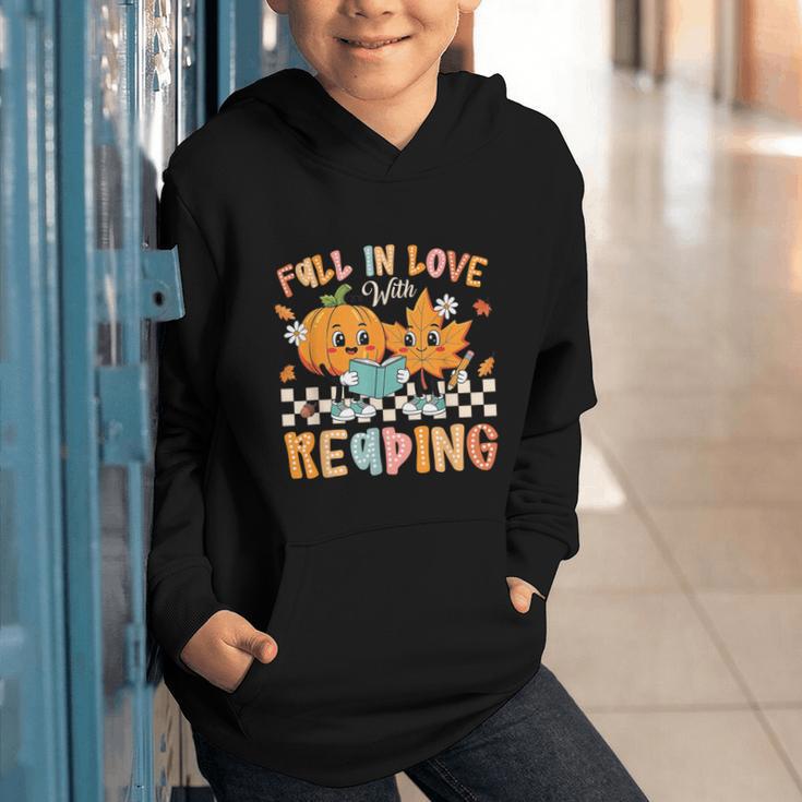 Fall In Love With Reading Thanksgiving Pumpkin Book Lover Graphic Youth Hoodie Fall In Love With Reading Thanksgiving Pumpkin Book Lover Graphic Youth Hoodie