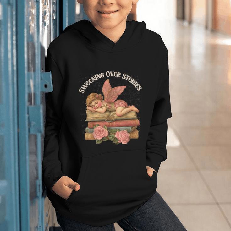 Valentine's Swooning Over Stories Cupid And Book Lover Tee Graphic Youth Hoodie