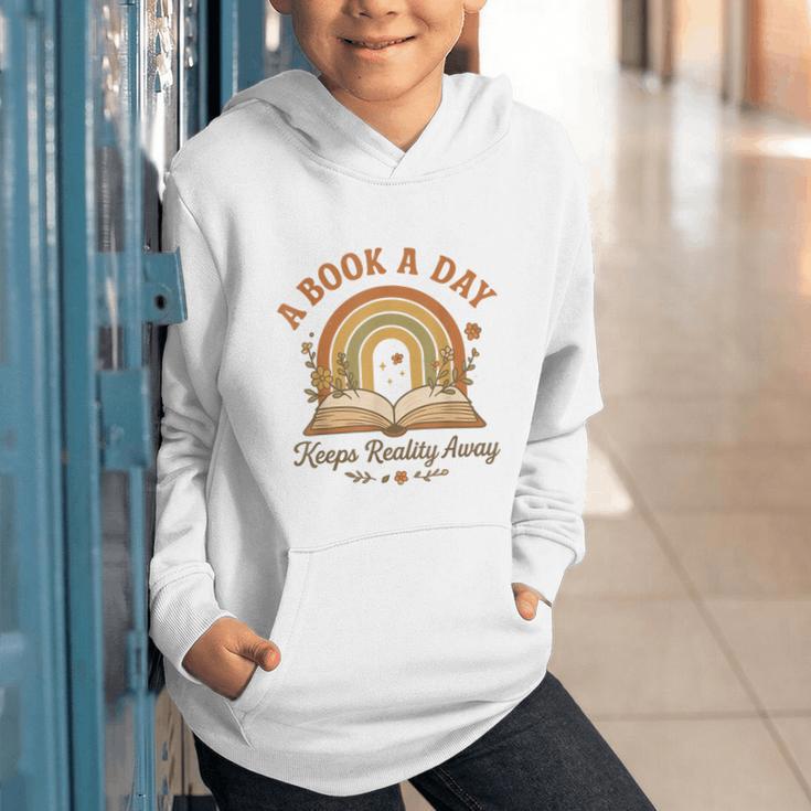 A Book A Day Keeps Reality Away Reading Graphic Youth Hoodie A Book A Day Keeps Reality Away Reading Graphic Youth Hoodie