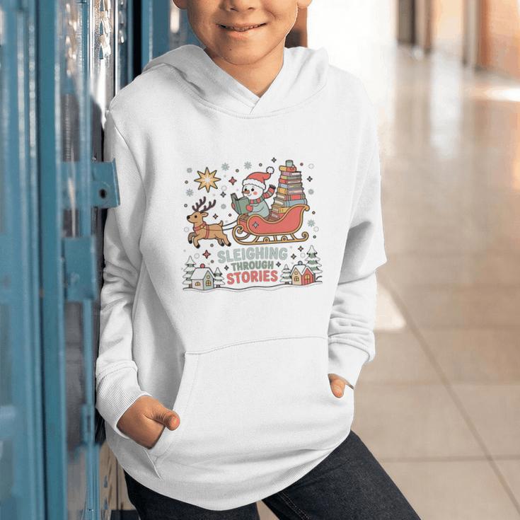 Book Lovers Winter Sleighing Through Stories Tee Premium Tri-Blend Graphic Youth Hoodie