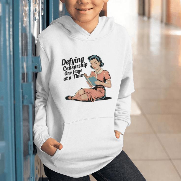 Defying Censorship One Page At a Time Read Banned Books Graphic Youth Hoodie Defying Censorship One Page At a Time Read Banned Books Graphic Youth Hoodie
