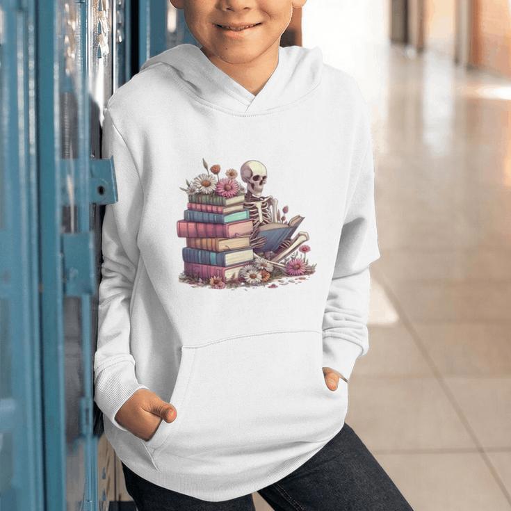 Reading A Book Per Day Keeps Reality Away Skeleton Books Graphic Youth Hoodie