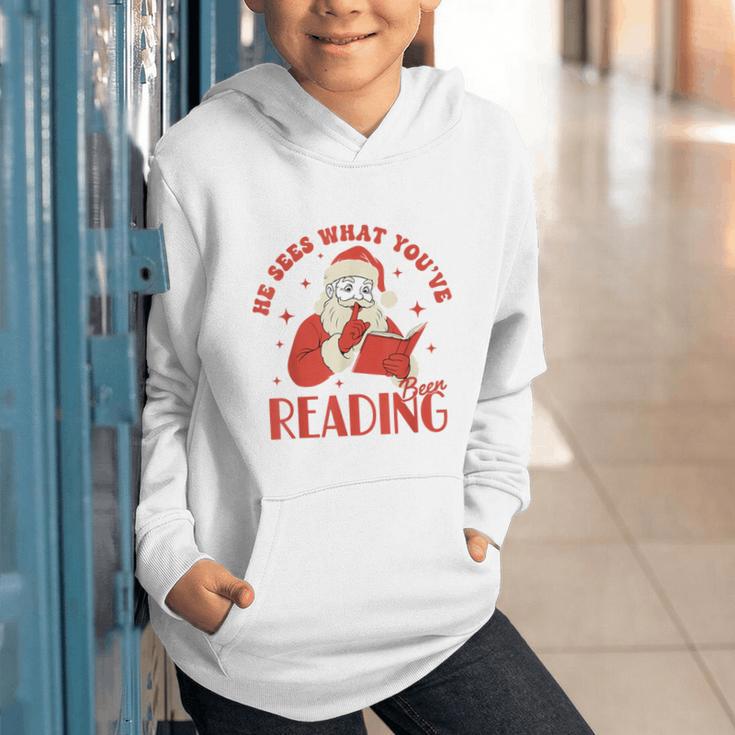 He Sees What You'Ve Been Reading Santa Book Graphic Youth Hoodie