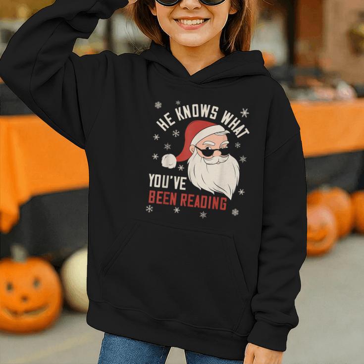 He Knows What You'Ve Been Reading Book Lover Women Santa Graphic Youth Hoodie