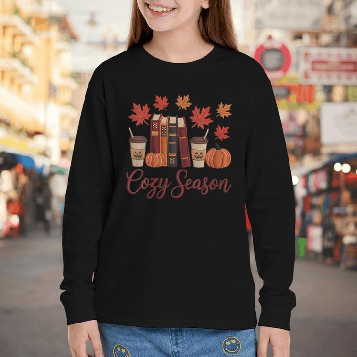 Cozy Season Autumn Leaves Books Pumpkins Fall Halloween Youth Long Sleeve Tee