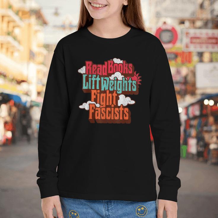 Read Books Lift Weights Fight Fascists Reading No Kings Youth Long Sleeve Tee