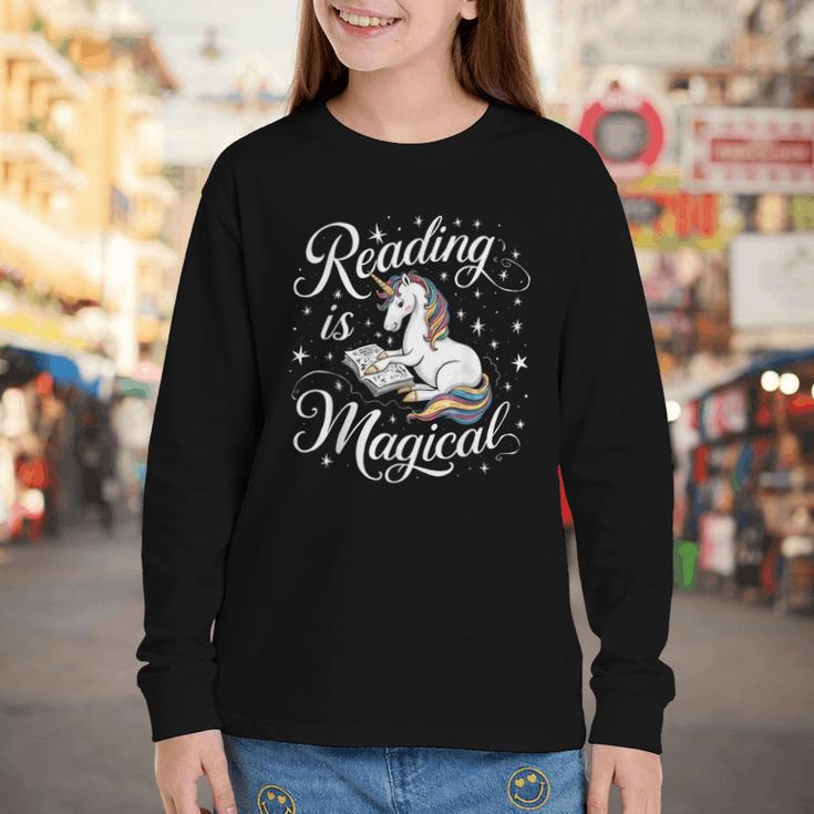 Reading Is Magical Unicorn Book Lover Fantasy Kids Youth Long Sleeve Tee Reading Is Magical Unicorn Book Lover Fantasy Kids Youth Long Sleeve Tee